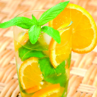 orange and mint in a glass